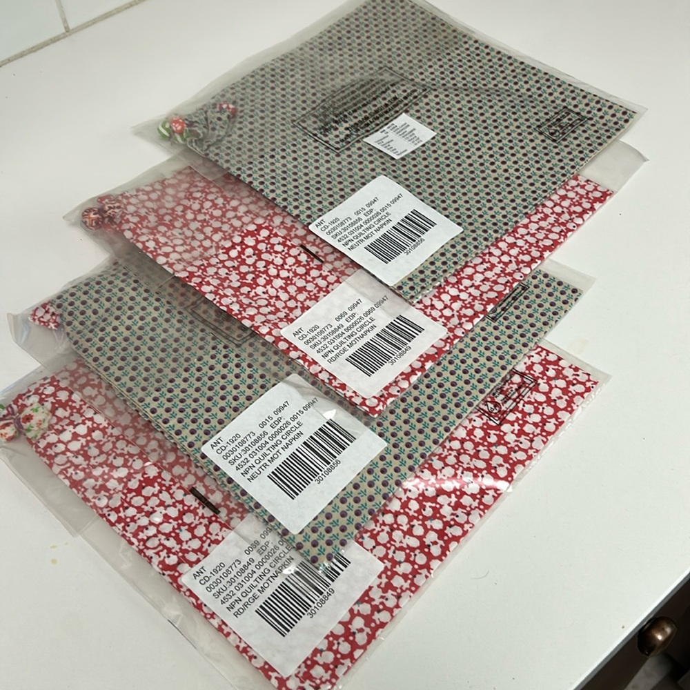 NWT Anthropologie Table Napkins Set of 4, new sealed pkgs, ornaments on corner